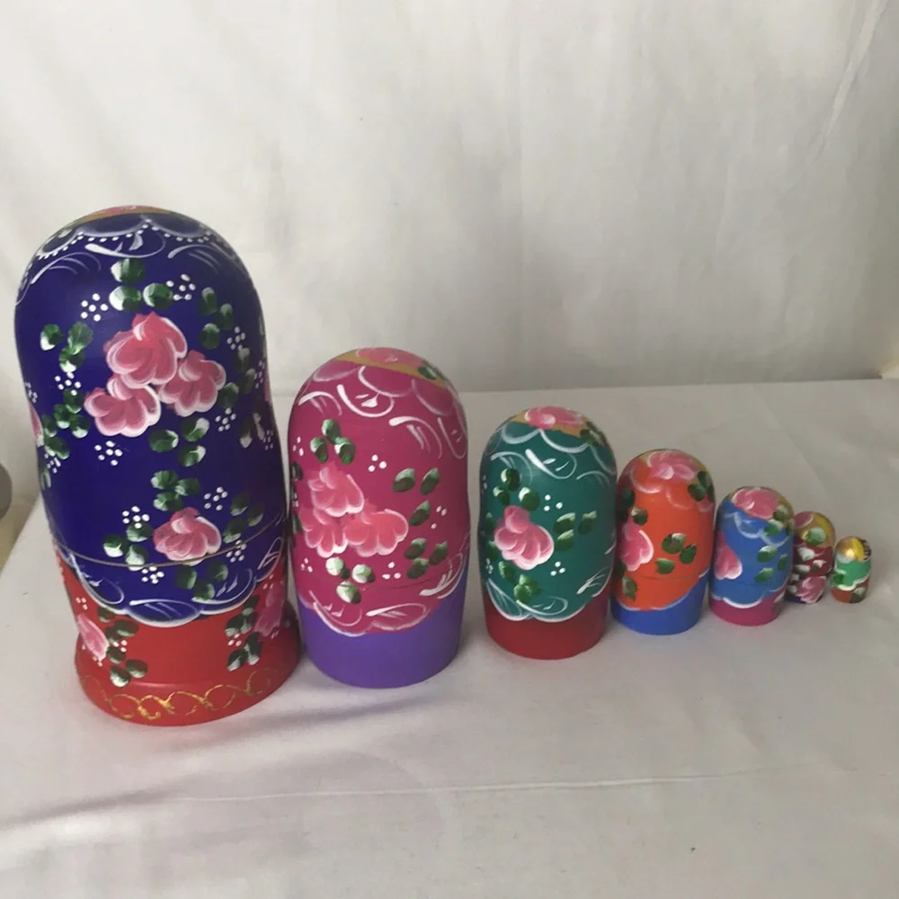 Beautifully decorated nesting dolls set
